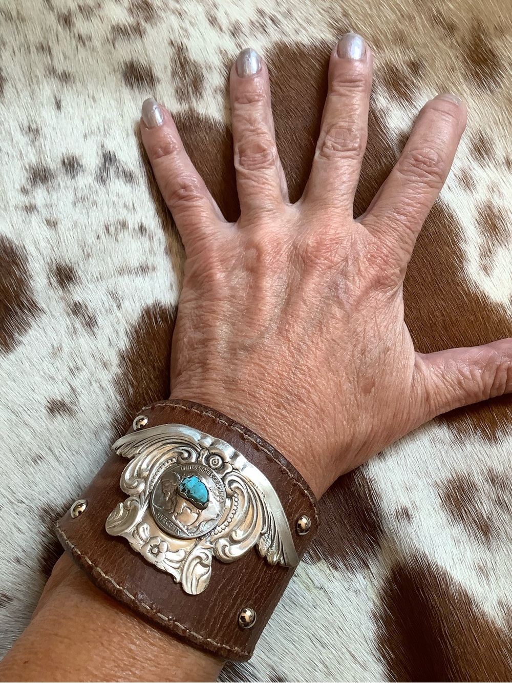 Leather cuff, adjustable 6-6 3/4” wrist